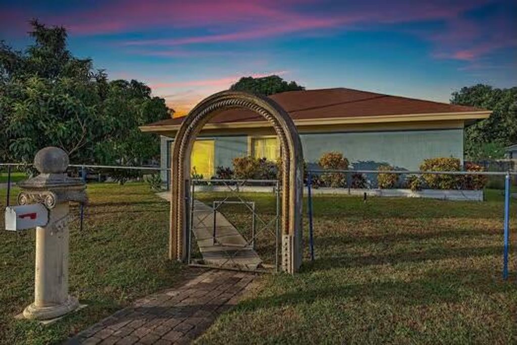 Photo of 4229 Bougainvillea Street, West Palm Beach, FL 33406 (MLS # R10997422)