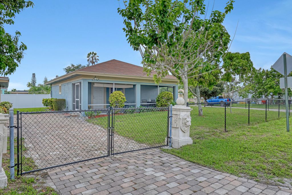 Photo of 4229 Bougainvillea Street, West Palm Beach, FL 33406 (MLS # R10997422)