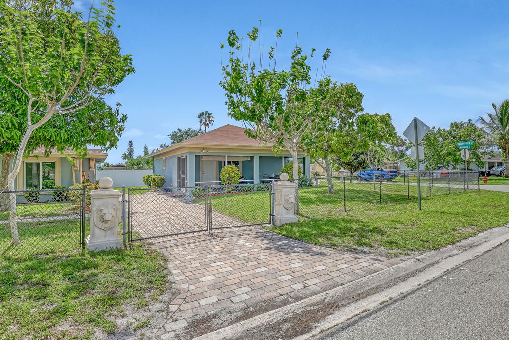 Photo of 4229 Bougainvillea Street, West Palm Beach, FL 33406 (MLS # R10997422)