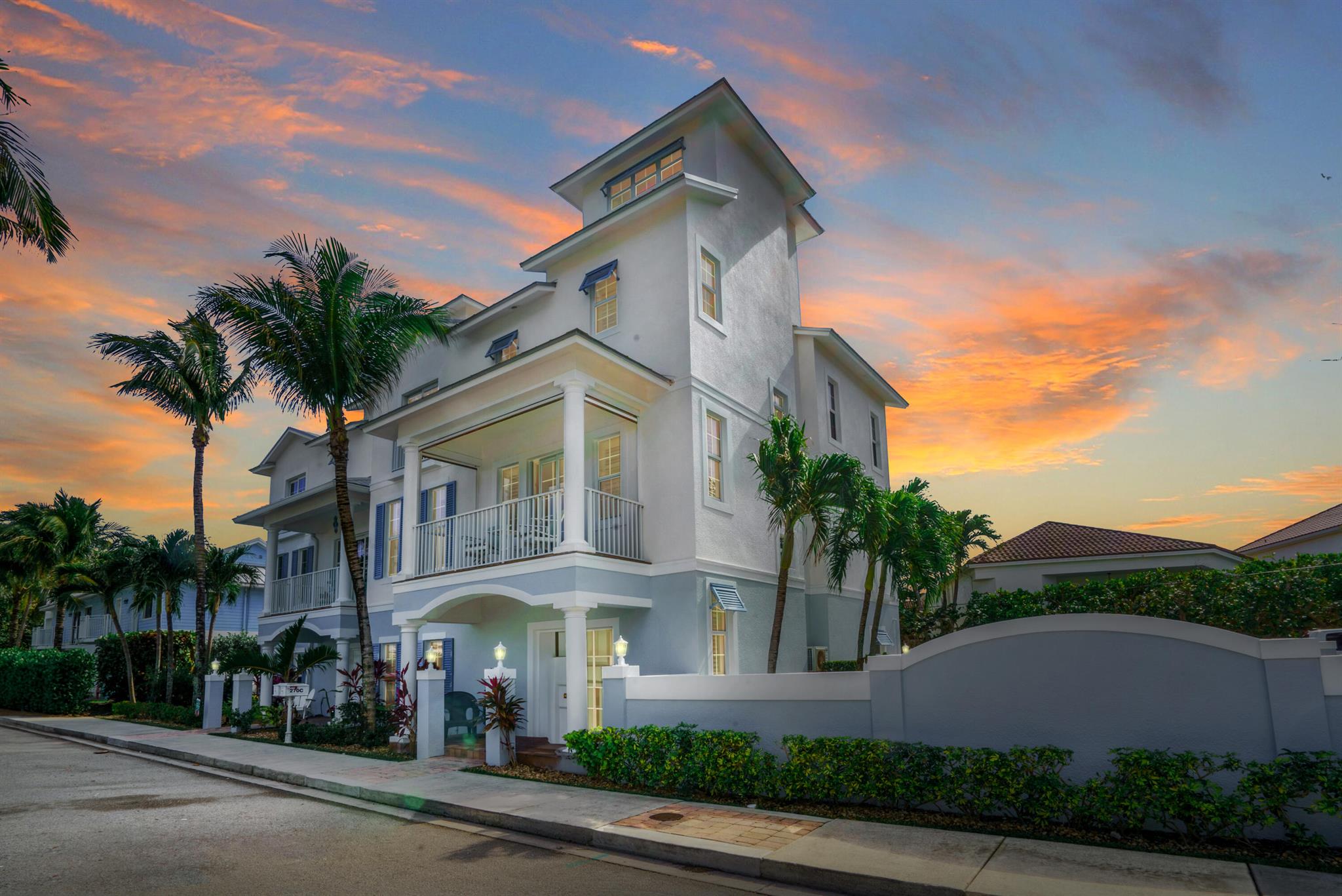 FURNISHED ANNUAL. Located on the coveted ocean block of Mercury Circle, this is coastal living at its finest! This 4,277 SF four-level townhome in the charming seaside community of Juno Beach, has breathtaking panoramic ocean views from the 507 SF top level deck, as well as views of beautiful Pelican Lake. As you sip and enjoy your morning coffee, you can relax and watch the sunrise over the ocean or enjoy evening cocktails with a pleasant ocean breeze and spectacular sunsets. Very rare and unique, this property has beach access, all impact glass, three bedrooms, three and a half baths, three balconies, hydraulic elevator, and pool. The three en-suite bedrooms ensure privacy for everyone.The spacious family room has a gas fireplace and is adjacent to the open kitchen with quartzite