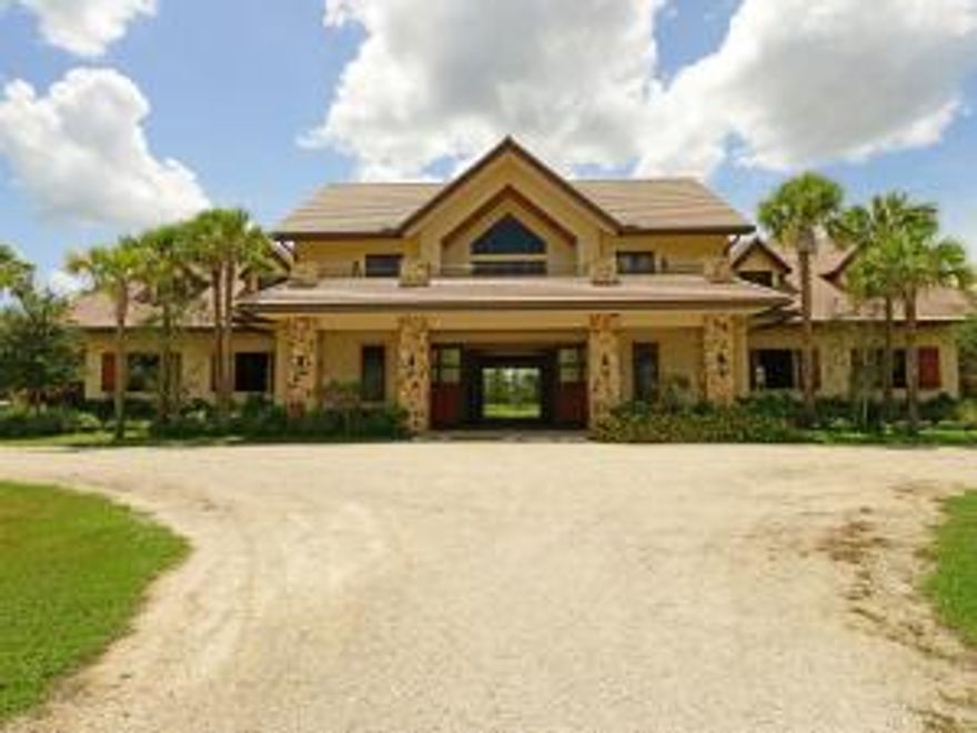 Building Pad in place for your personalized design! For the equestrian, pristine, well constructed opportunity for those who want the best for their animals-  10 stall barn with hot/cold wash stations, fly spray system, tack wall rotates to display in center aisle from AC storage.  Upstairs provides total comfort for the owners and/or guests.  Pad is in place as are plans for future residence. Lot is bordered by preserve on two sides.  4 turnouts, arena w jumps, drainage and irrigation.  Seriously, it's beautiful, come see.