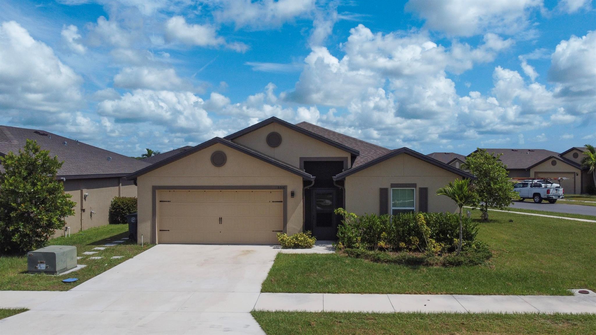 Built in 2022, this 5-bedroom, 3-bathroom home offers nearly 2,000 square feet of low-maintenance, modern living. Beautiful inside and out, it features an open-concept layout, upgraded flooring, and a stylish kitchen with granite countertops, stainless steel appliances, and ample cabinet space. The spacious primary suite includes a private bath and a large walk-in closet, while the additional bedrooms offer flexibility for family, guests, a home office--or all of the above! Situated on a large corner lot in a desirable HOA community with a sparkling pool, this home also features a screened-in patio perfect and oversized corner lot. Conveniently located near shopping, dining, schools, and major highways, it's move-in ready and full of modern charm. Call today for your private tour!