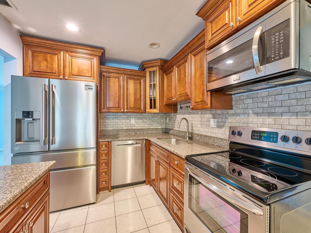 Photo of 1710 SW 22nd Street, Boynton Beach, FL 33426 (MLS # R11146596)