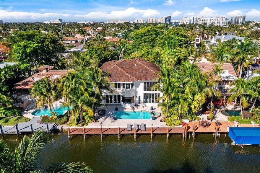 Superbly located in highly desirable guard house gated & security patrolled Seven Isles. This beautifully presented deep-water residence offers 75 ft of dockage (allows for 55 ft boat) & is primely situated towards the end of the Isle. The flexible floorplan flows perfectly & includes large appealing entertaining areas with formal living & dining room, home office/library plus large family room which opens to the kitchen (all water facing). Impact glass windows & doors provide for abundant natural light. There is one bedroom on the lower level and four expansive bedroom suites on the second level. The Master is privately located & offers a spa style bathroom and large closets.  Available for a quick closing to enjoy the perfect SoFlo waterfront lifestyle this spring.