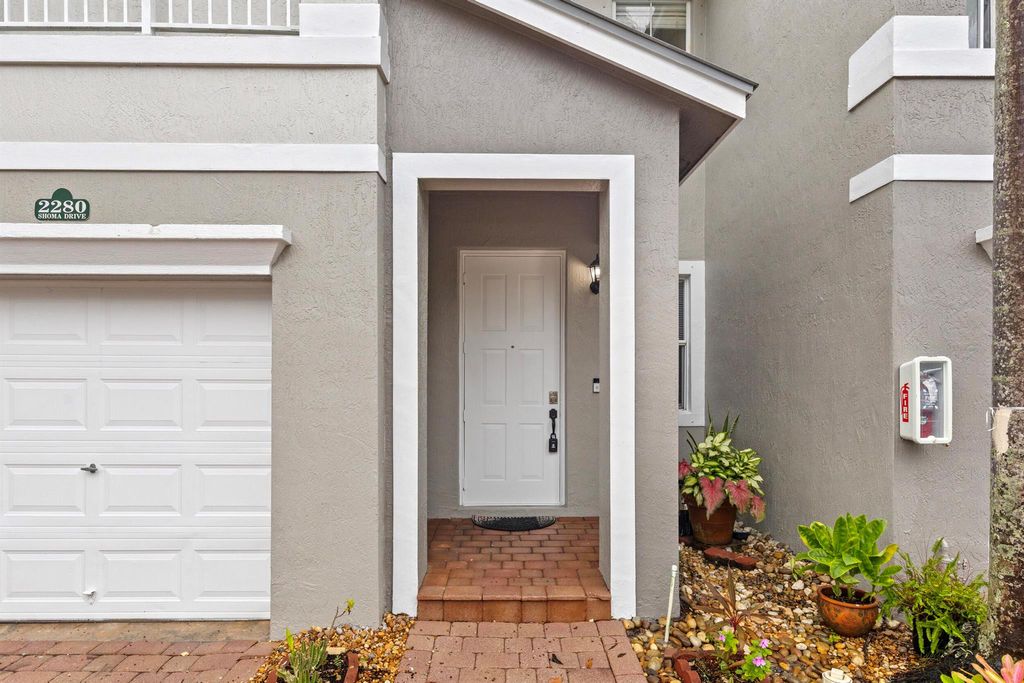 Photo of 2280 W Shoma Drive, Royal Palm Beach, FL 33414 (MLS # R11104958)