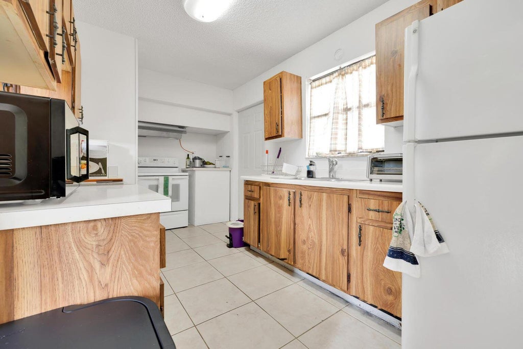 Photo of 3774 92nd Lane N, West Palm Beach, FL 33403 (MLS # B26044775)