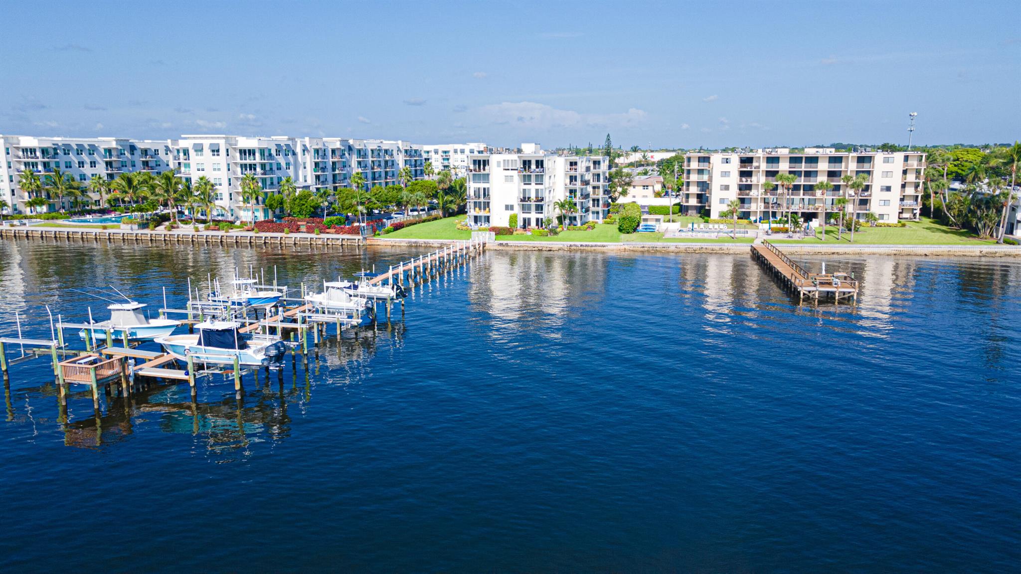 Gorgeous CONDO located in the heart of the City of Lantana, only minutes from restaurants, shopping centers, beaches and I-95. This fully furnished 2 bedroom, 2 bathroom condo boasts a modern, bright and open floor plan with the most stunning panoramic views of the Intercostal. The property also features impact rated windows and doors, wood kitchen cabinets, granite countertops, stainless steel appliances, marble floors, private wraparound balcony, dedicated storage area and much more. James Place offers great amenities including water, a community pool, sauna, cabana bathroom, BBQ area, laundry room, fishing dock, and more. The condo comes with 2 assigned