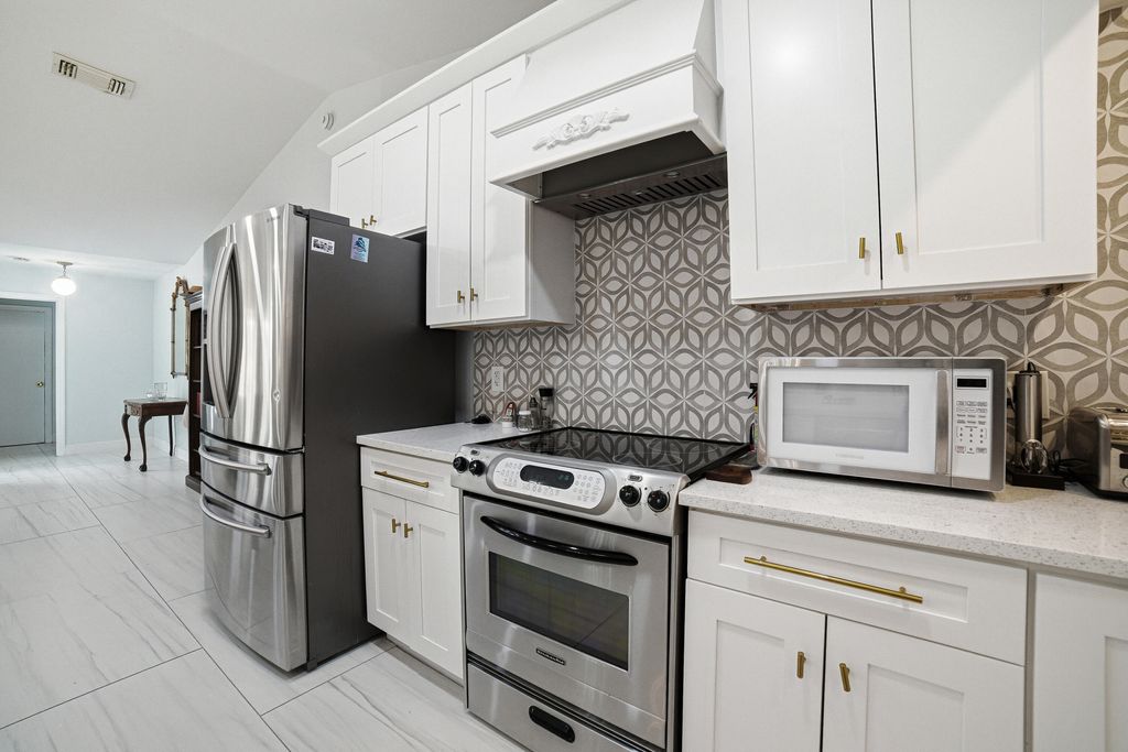 Photo of 949 SW Curtis Street, Port Saint Lucie, FL 34983 (MLS # R11158398)