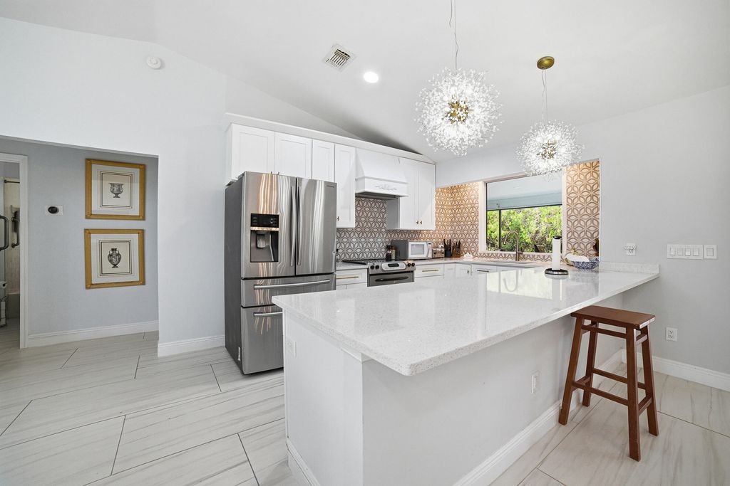 Photo of 949 SW Curtis Street, Port Saint Lucie, FL 34983 (MLS # R11158398)