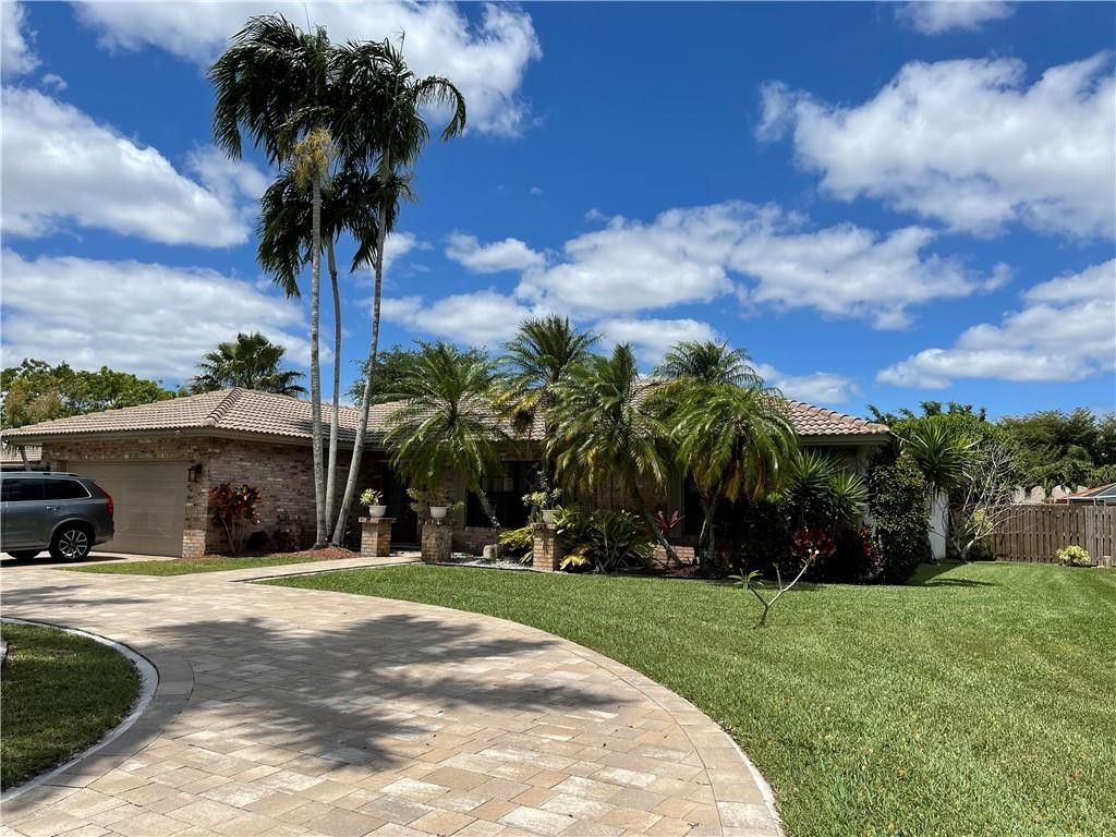 Photo of 11431 NW 18th Manor, Coral Springs, FL 33071 (MLS # B26028901)