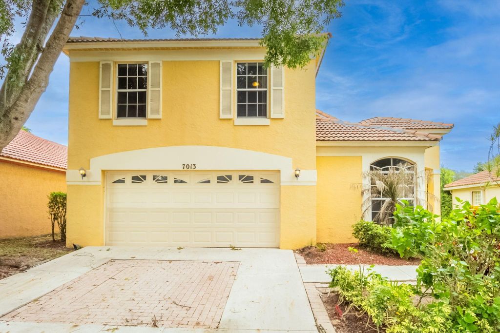Photo of 7013 Galleon Cove, Riviera Beach, FL 33418 (MLS # F10528259)