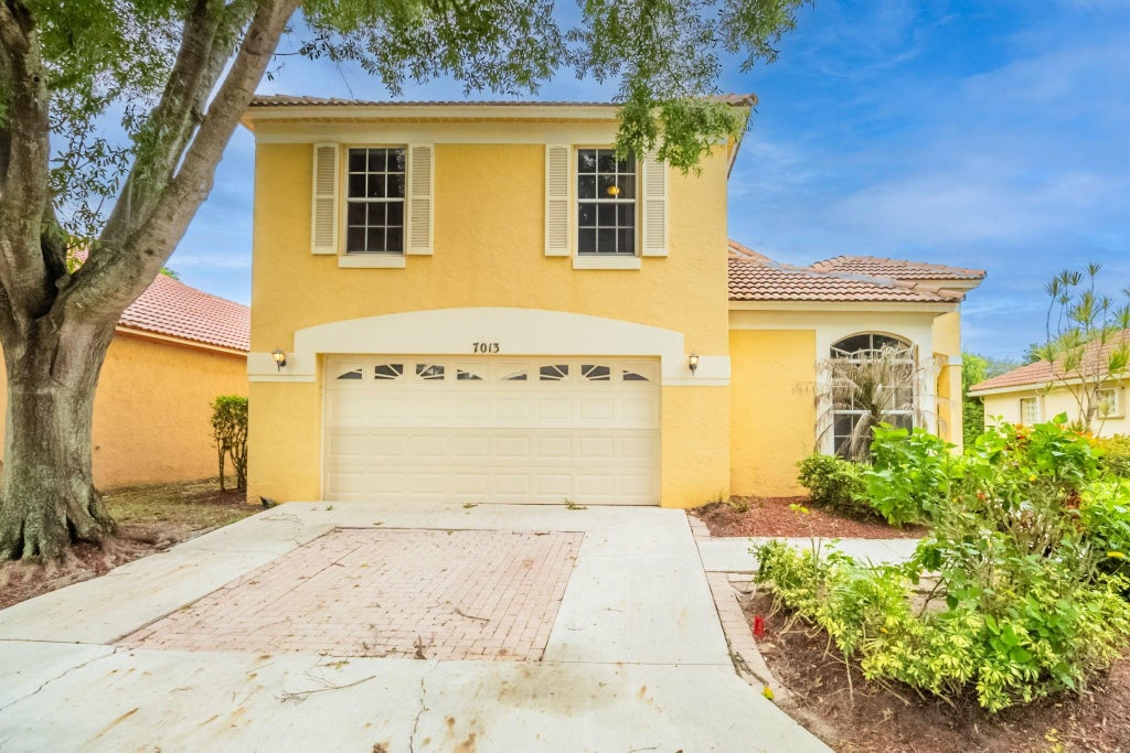 Photo of 7013 Galleon Cove, Riviera Beach, FL 33418 (MLS # F10528259)