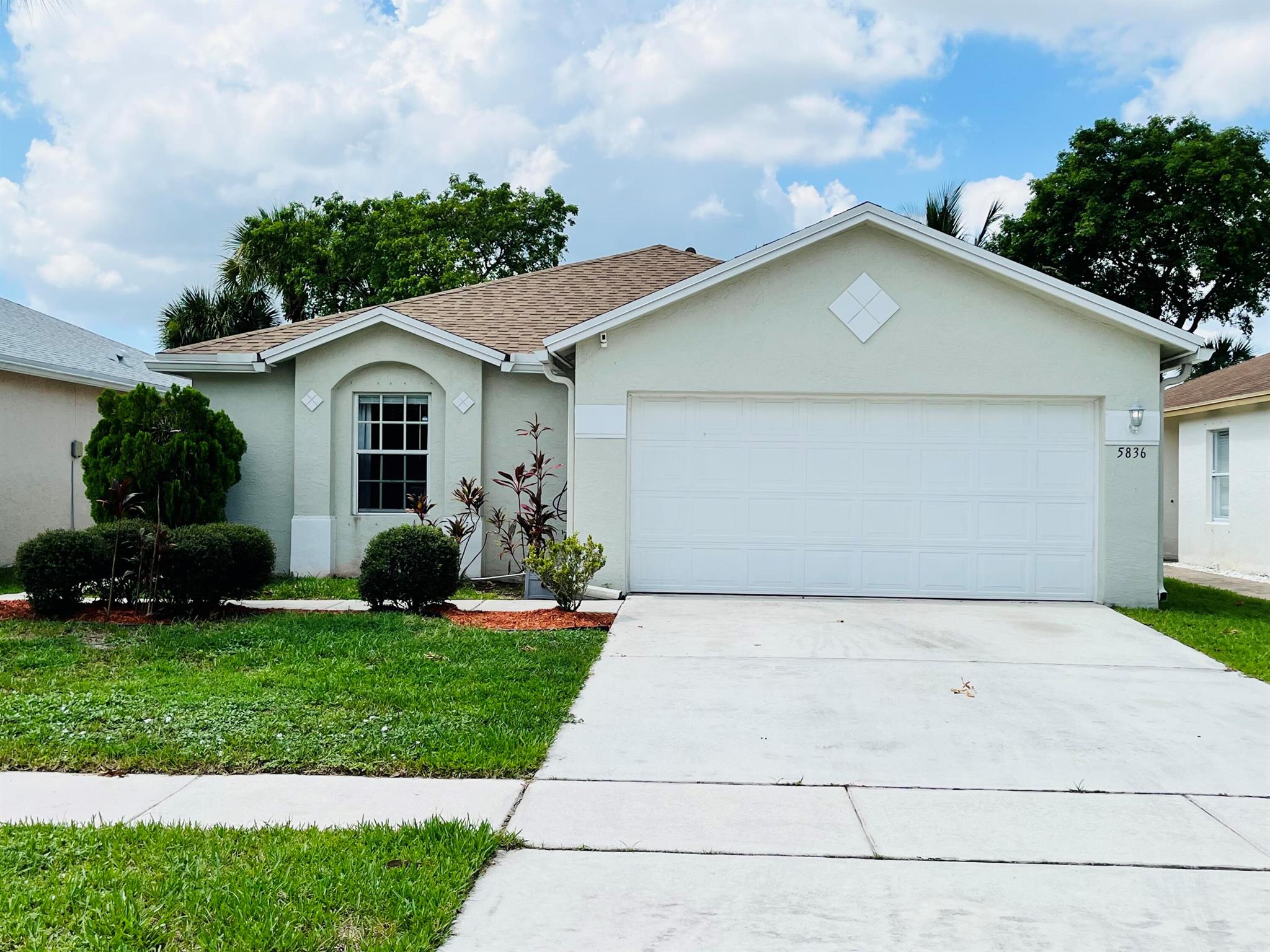 Welcome home to this move in ready 3 bedroom, 2 bath gem with a 2021 roof! The open, split bedroom floor plan features soaring high ceilings throughout. The spacious master suite offers a large bath, dual closets, and a versatile sitting area to fit your needs. Outside, enjoy a fully fenced yard with a large paved patio, perfect for entertaining. The garage has been converted into extra living space, ideal as a bonus room or extra bedroom. Located in Victoria Woods, a desirable all ages gated community with pool, tennis, pickleball, racquetball, basketball, baseball, volleyball, dog park, playground, and more. Don't miss this beautiful home with flexible living spaces!