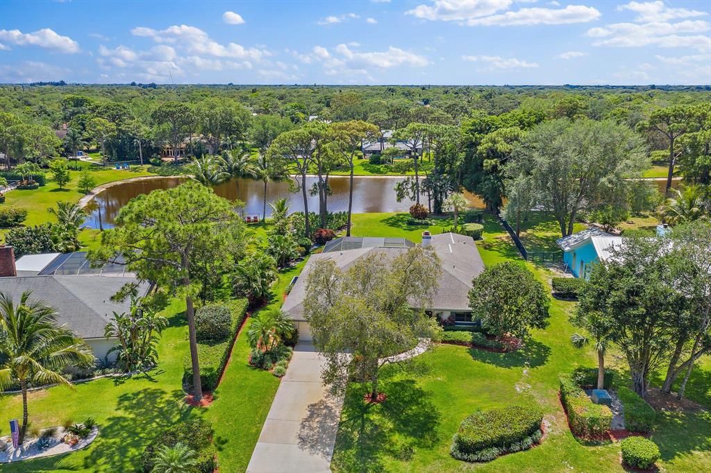 Photo of 6048 Woodlake Road, Jupiter, FL 33458 (MLS # R10706508)