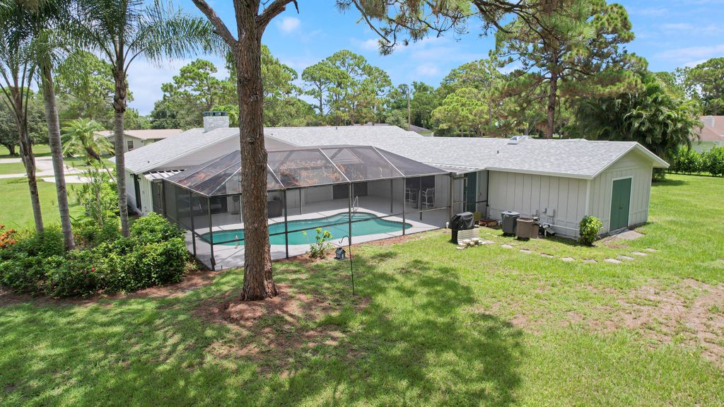 Photo of 6642 141st Lane N, Palm Beach Gardens, FL 33418 (MLS # R11001740)