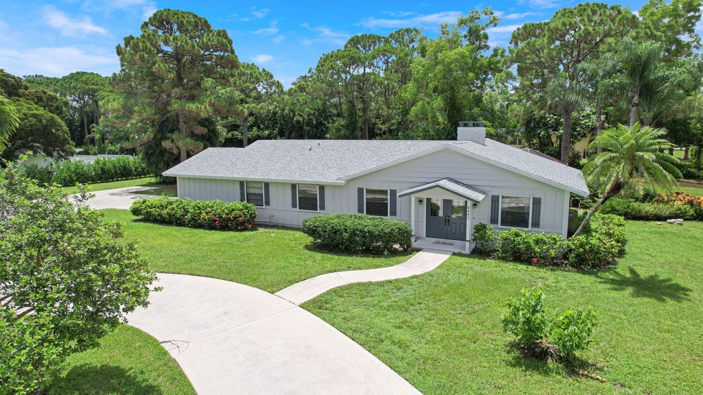 Photo of 6642 141st Lane N, Palm Beach Gardens, FL 33418 (MLS # R11001740)