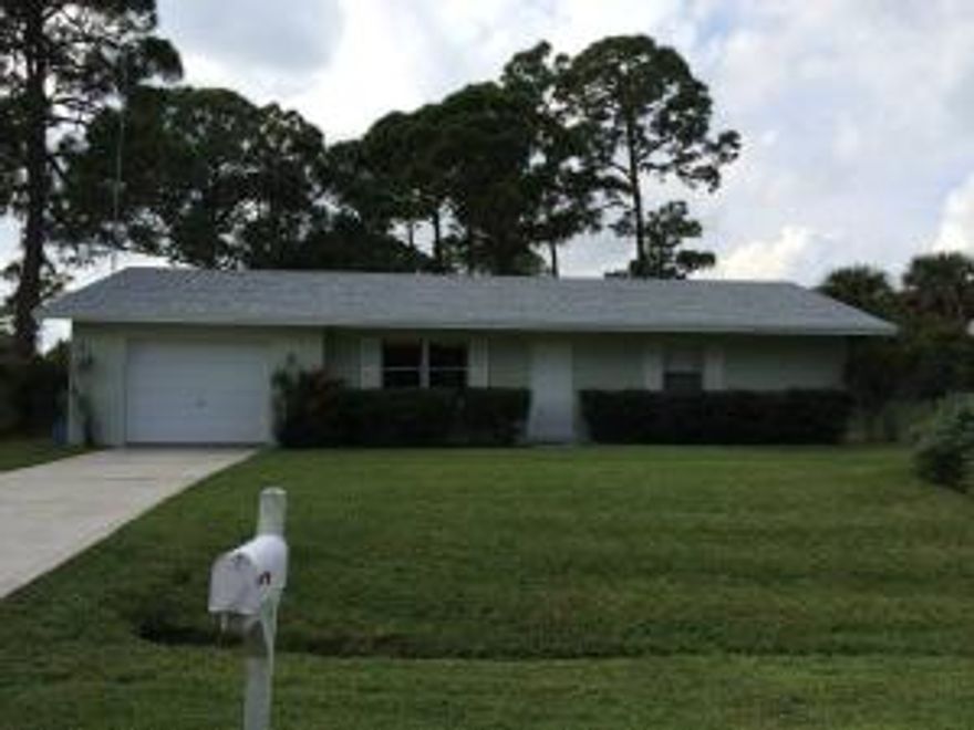 Solid CBS 2/2 with oversized 1 car garage. Centrally located. Minutes to St. Lucie West, I-95 and the Florida Turnpike. Well maintained and in move in ready condition. Quick closing...not a foreclosure or short sale!