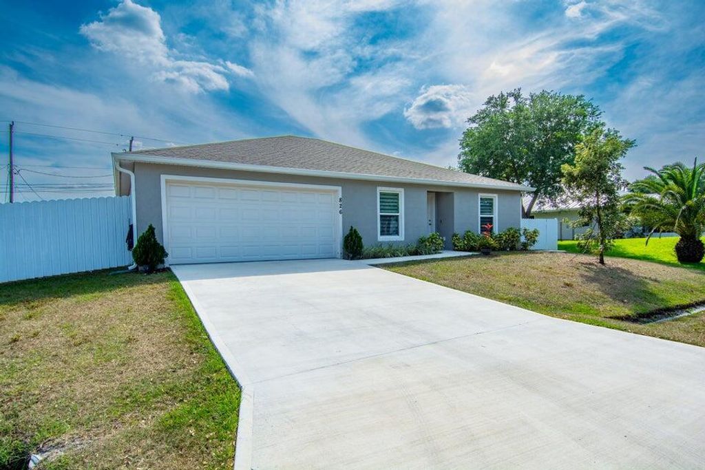 Photo of 826 SW Juliet Avenue, Port Saint Lucie, FL 34953 (MLS # R11097111)