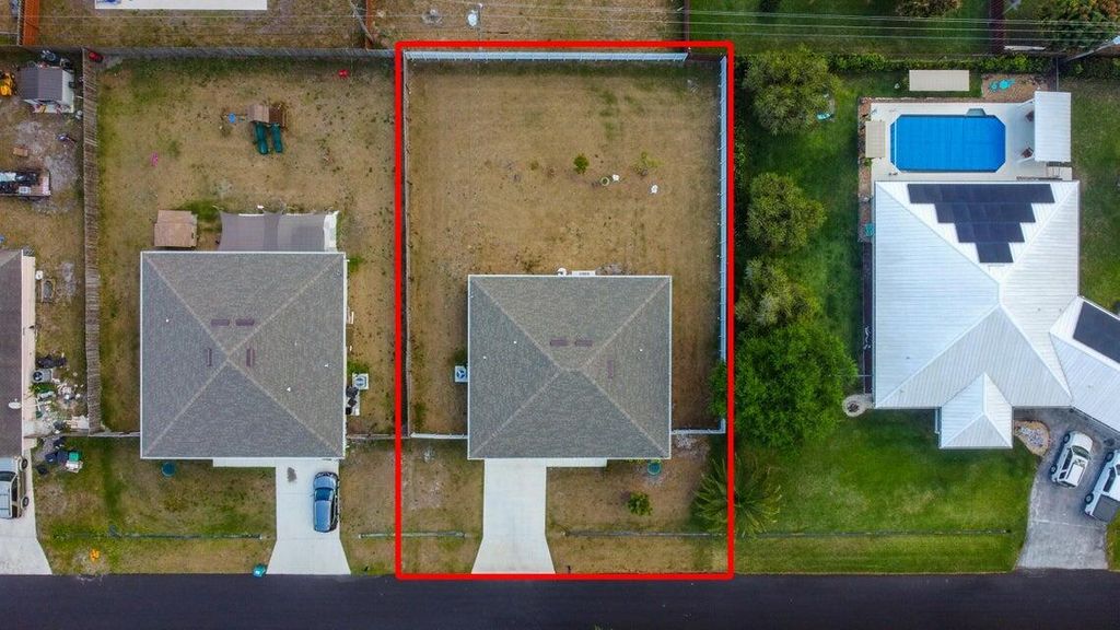 Photo of 826 SW Juliet Avenue, Port Saint Lucie, FL 34953 (MLS # R11097111)