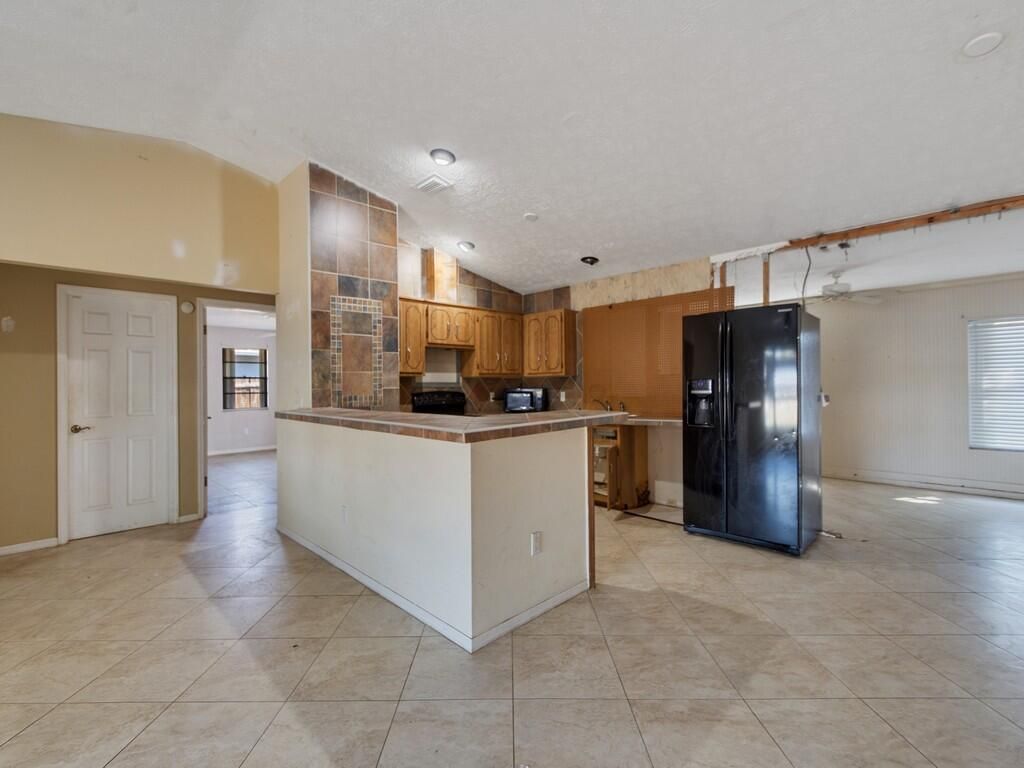 Photo of 502 NW Goldcoast Avenue, Port Saint Lucie, FL 34983 (MLS # B26002719)