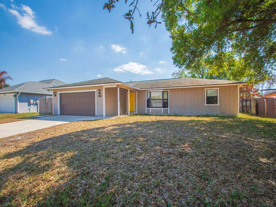 Opportunity awaits your future home or investment features a functional 3 bed, 2 bath split plan  layout with spacious yard  providing ample outdoor potential. A generous living area with vaulted ceilings, an open kitchen space, and a rear enclosed porch that could be transformed into additional living or entertaining space. This property presents a opportunity for buyers looking to customize a home to their own style. With solid bones and a desirable floor plan, the possibilities for renovation and personalization are endless.  Conveniently located near shopping, dining, schools, and major roadways, this home offers both accessibility and long-term potential  ALL MEASUREMENTS ARE APPROXIMATE