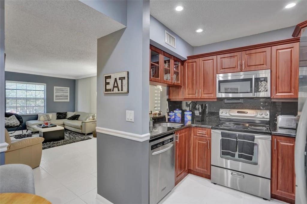 Photo of 10791 NW 14th Street #303, Plantation, FL 33322 (MLS # B26048334)