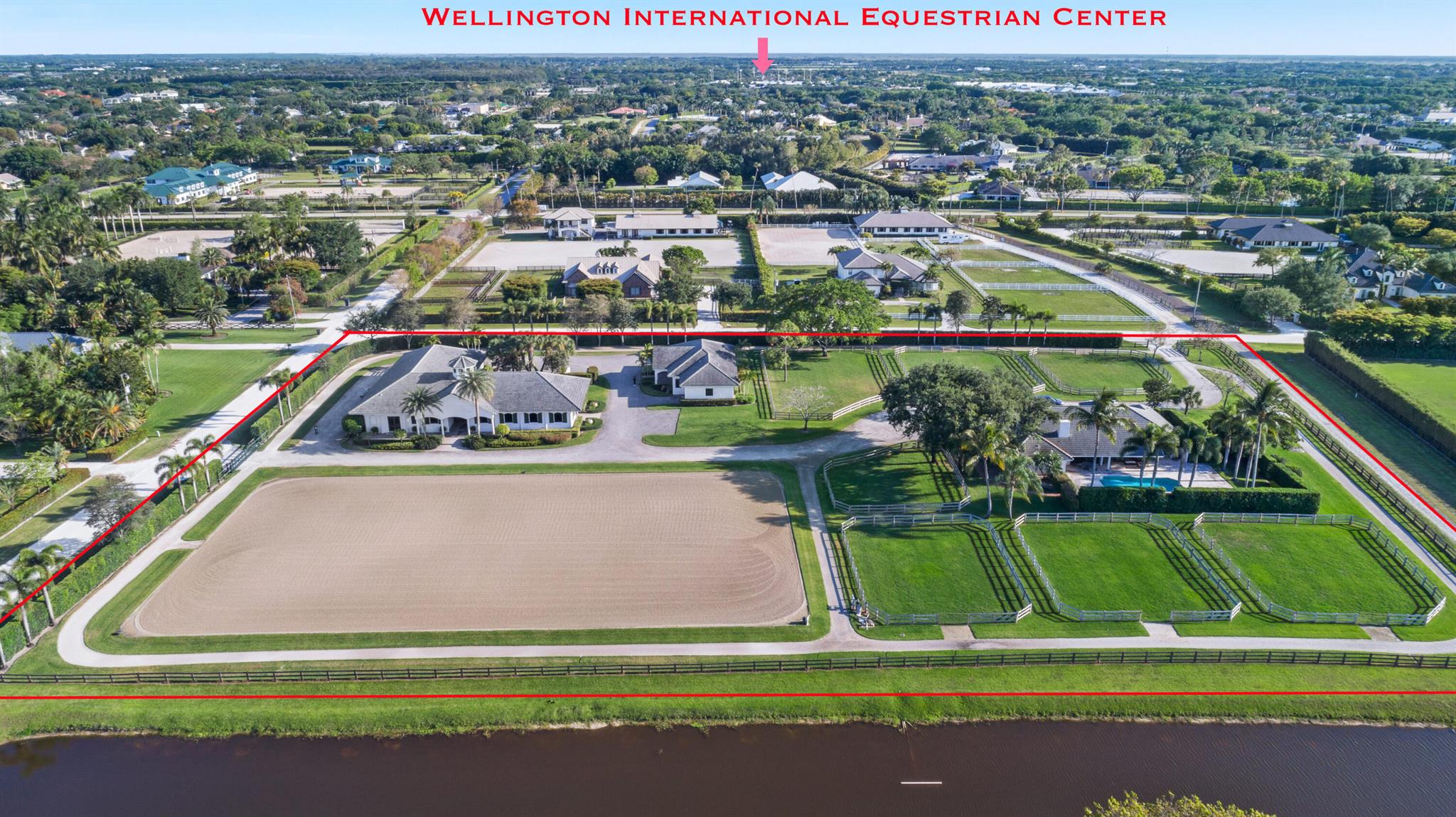 Pristine and professional,16 stall center aisle stable on, 4 + AC . 7 Shaded and lush paddocks, 2 feed rooms with laundry, 2 tack/office rooms, 4 wash stalls. Two 2 BR, 2 BA apartments . - 125 by 225 Ebb and flow system footing ring by Travis Gould JTWG Equestrian Surfaces- 1/3 mile irrigated all weather track around the 4 acres - ample client parking. Located on the bridlepath. Just a short walk to WEF show grounds.