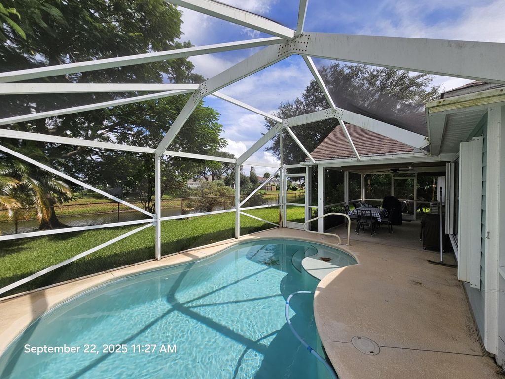 Photo of 957 SW Jacqueline Avenue, Port Saint Lucie, FL 34953 (MLS # R11126354)