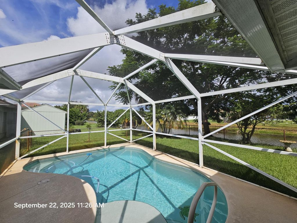 Photo of 957 SW Jacqueline Avenue, Port Saint Lucie, FL 34953 (MLS # R11126354)