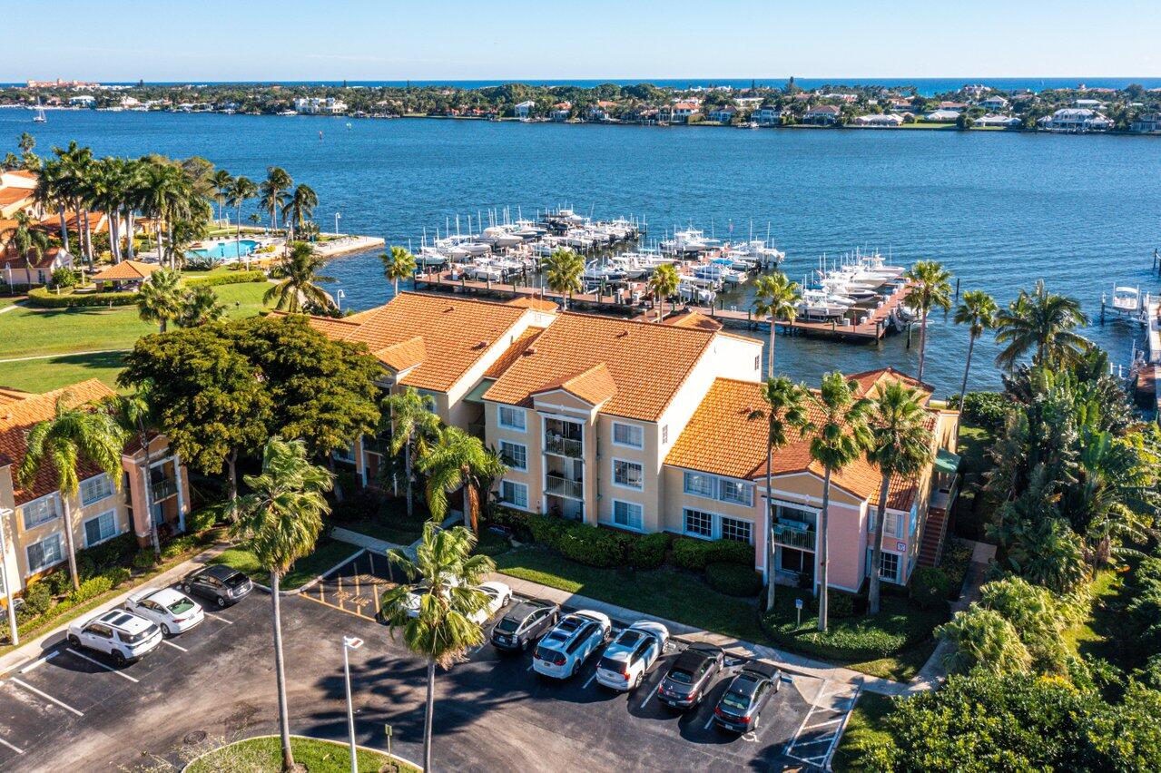 Enjoy this short term or long term rental in The Yacht Club. This is a beautiful waterfront gated community and offers great amenities and convenient location. Enjoy the intracoastal views and marina from the community pool. Plenty of space in the fully furnished 2 bedroom 2 bathroom unit with full size washer and dryer. Live like you are on vacation! Association requires 725 credit score.