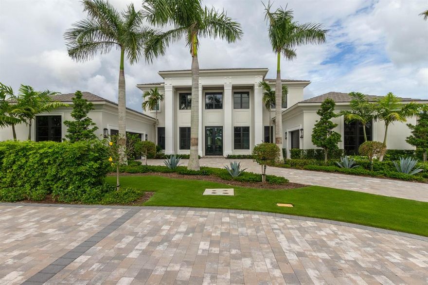 NEWLY PRICED FOR IMMEDIATE SALE! This custom home is brand new and sits on an estate lot with spectacular golf and lake views.  Built by the premier builder Chourchane Development to the highest standards anyone would expect.  If your looking for the best opportunity in Old Palm this home is a must see.  Over 6100 square feet of living space with 5 bedrooms,club room/office and custom built ins throughout. Expansive pool and Spa area  with expansive areas for entertaining.