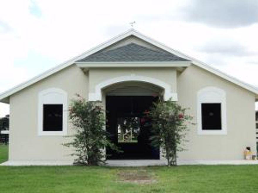 5.37 acres of Equestrian farm with   center aisle 12-stall barn and 3 walk out stalls. Floors in barn and stalls are matted. Each stall has fan and fly spray system. 4 wash stalls (2 open and 2 covered), grassy paddocks, irrigated sand ring with jumps, feed room, tack room, laundry with Washer and Dryer & Half bath . Cottage also available- kitchen, living area, covered patio, 2 bedrooms each with full bath.Seasonally available for $10,000 per stall per season ( 3 months).property is available  for additional time before or after WEF. Very easy hack to equestrian show grounds.