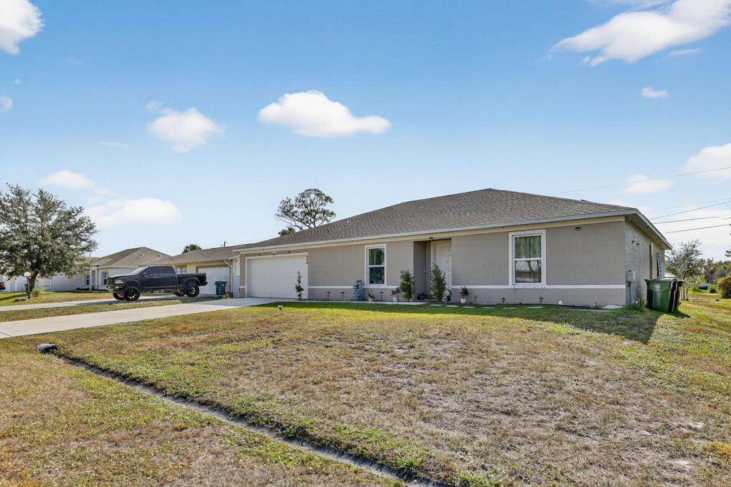 Photo of 644 SW Hoffenberg Avenue, Port Saint Lucie, FL 34953 (MLS # R11148340)