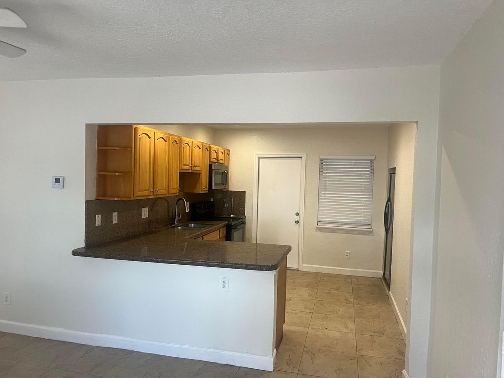 Photo of 3305 Lake Avenue, West Palm Beach, FL 33405 (MLS # R11161103)
