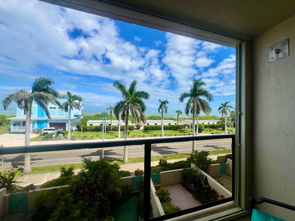 Photo of 355 S Ocean Drive #303, Hutchinson Island, FL 34949 (MLS # R11128641)