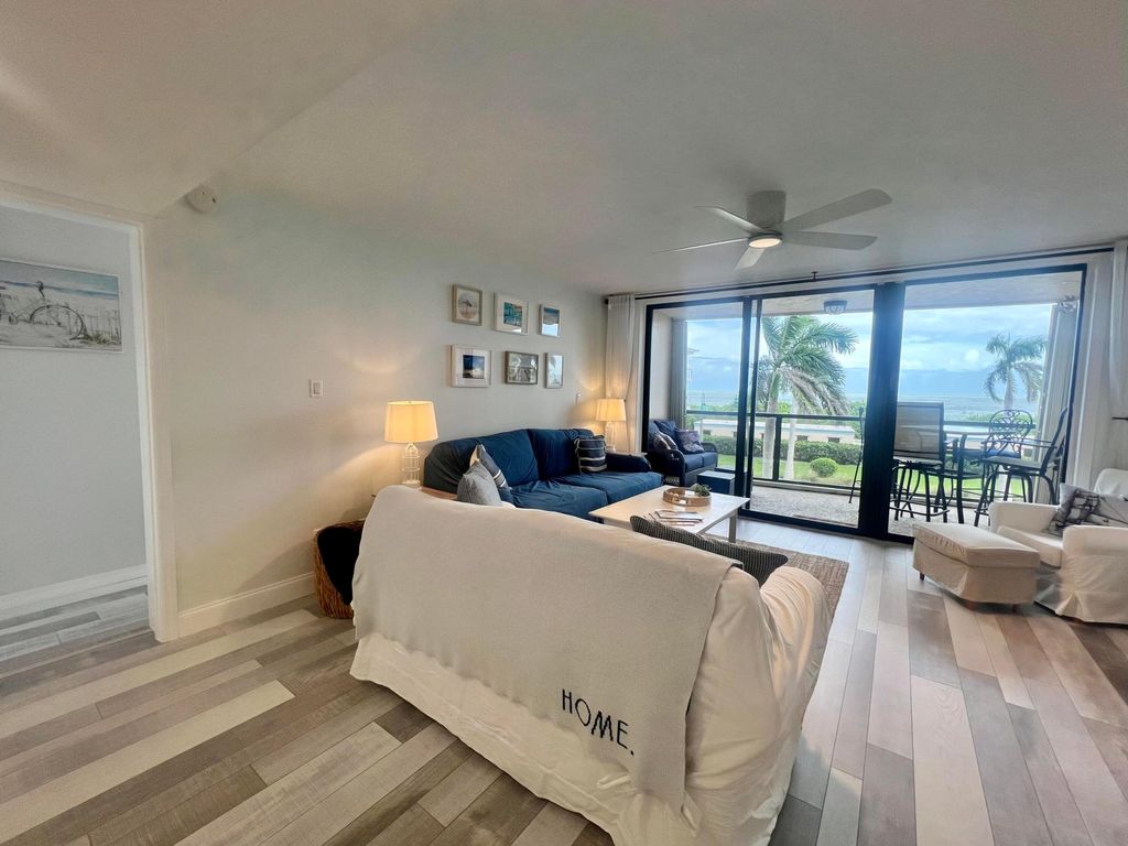 Photo of 355 S Ocean Drive #303, Hutchinson Island, FL 34949 (MLS # R11128641)