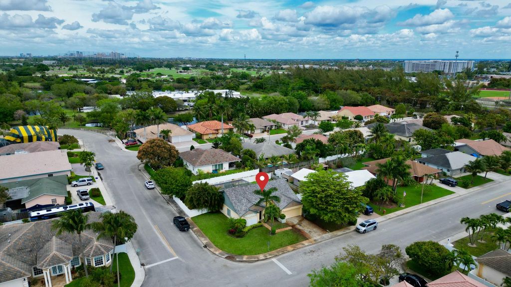 Photo of 1740 22nd Avenue N, Lake Worth Beach, FL 33460 (MLS # B26009452)