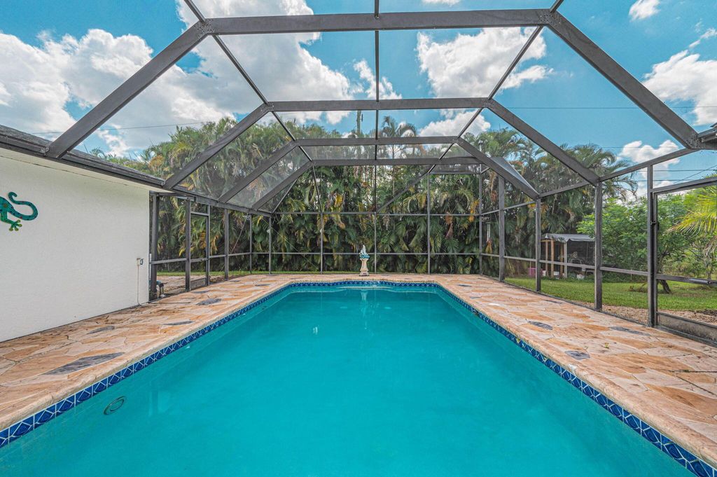 Photo of 1290 SW Fletcher Lane, Port St Lucie, FL 34953 (MLS # R10918281)