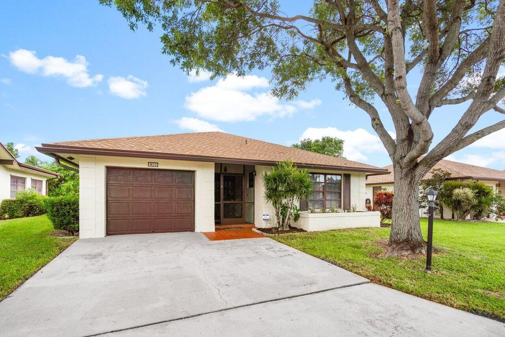 Photo of 6369 Lakemont Circle, Greenacres, FL 33463 (MLS # R11133107)