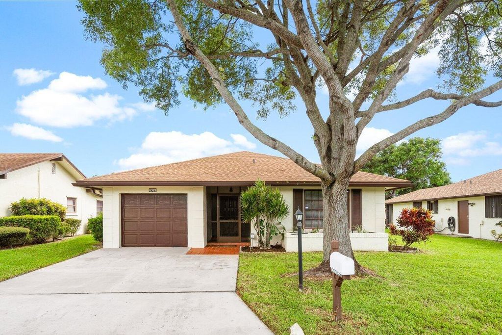 Photo of 6369 Lakemont Circle, Greenacres, FL 33463 (MLS # R11133107)