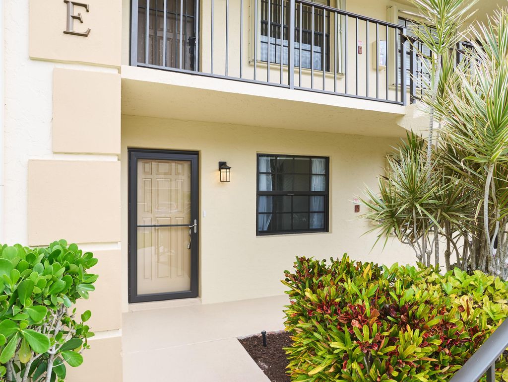 Photo of 1101 Pinecrest Circle #E, Jupiter, FL 33458 (MLS # B26015907)