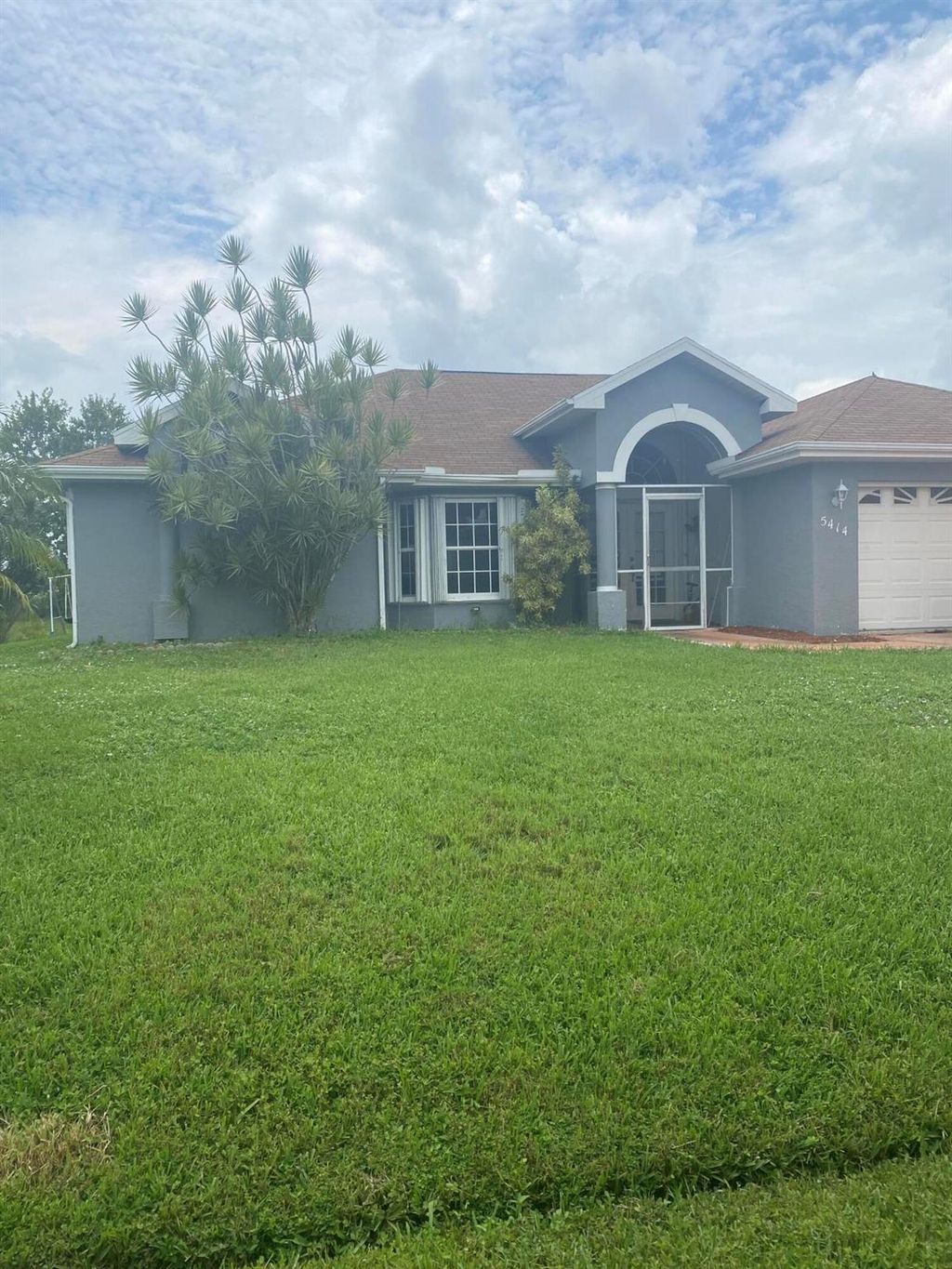 Photo of 5414 NW Emblem Street, Port Saint Lucie, FL 34983 (MLS # R11011250)