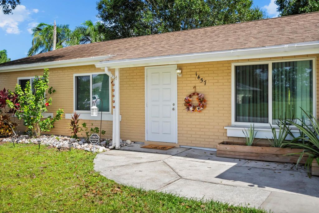 Photo of 1457 SE Buckingham Terrace, Port Saint Lucie, FL 34952 (MLS # R11131294)