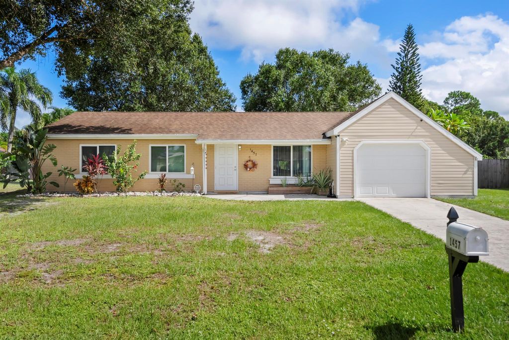 Photo of 1457 SE Buckingham Terrace, Port Saint Lucie, FL 34952 (MLS # R11131294)