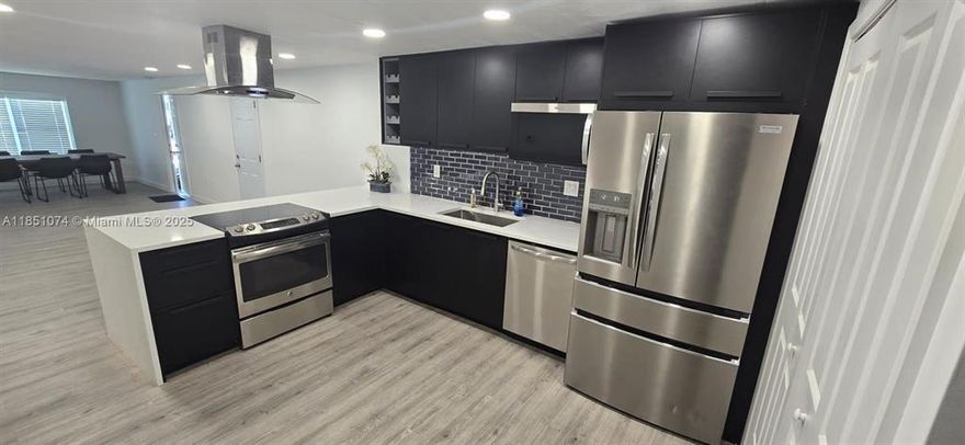 In the Hollywood area, close to I-95 and Stirling Road. Beautifully, completely renovated, spacious mobile home, featuring 4  bedrooms and 2 full bathrooms, modern design, spacious interiors, a lovely Florida room, a new kitchen, and the option to be fully or partially furnished.