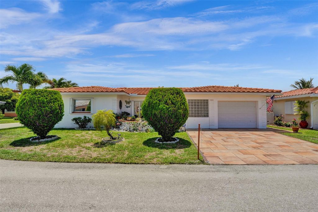 Photo of 5801 NW 86th Ter, Tamarac, FL 33321 (MLS # F10450042)