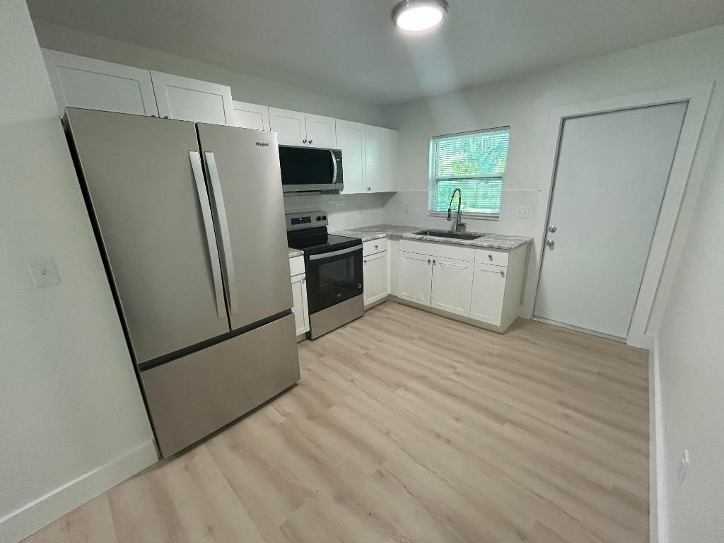 Photo of 2147 Sibley Avenue, Fort Pierce, FL 34982 (MLS # R11118082)