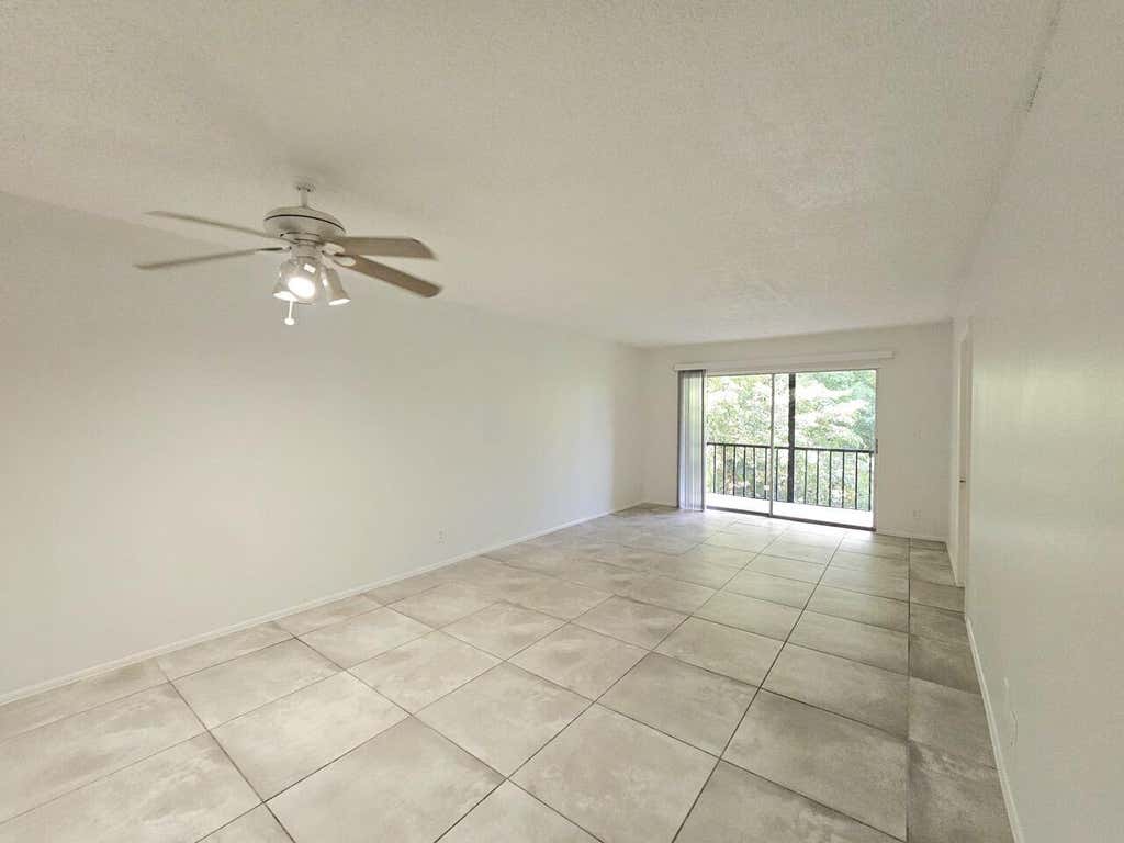 Photo of 8000 S Colony Circle, Tamarac, FL 33321 (MLS # B26068046)
