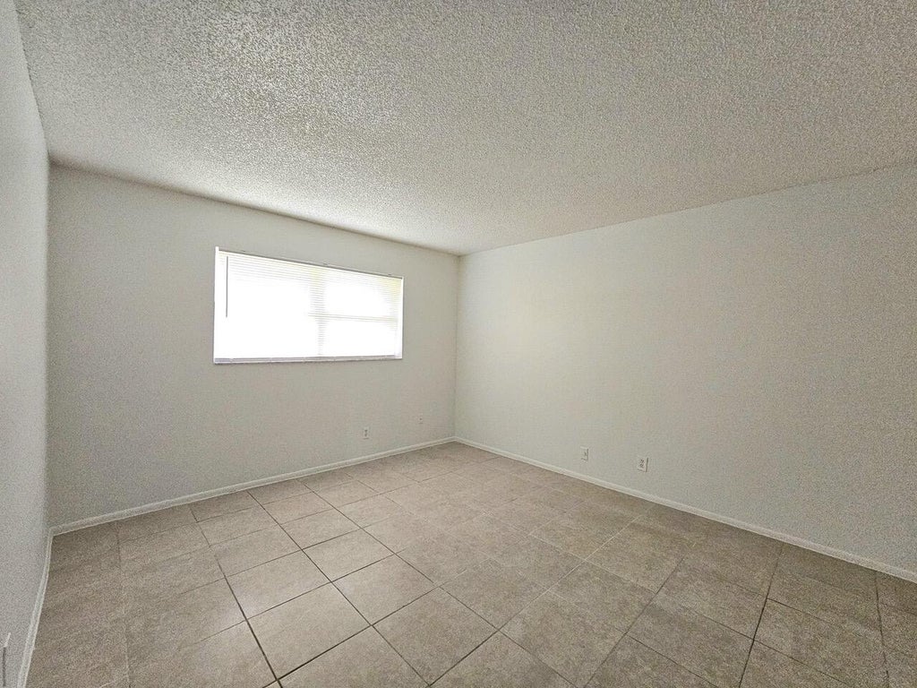 Photo of 8000 S Colony Circle, Tamarac, FL 33321 (MLS # B26068046)