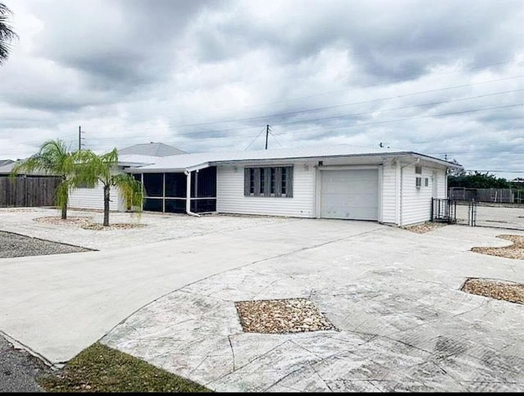 Photo of 12994 SE Papaya Street, Hobe Sound, FL 33455 (MLS # R10794226)